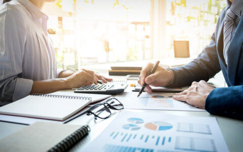 business man financial inspector and secretary making report, ca
